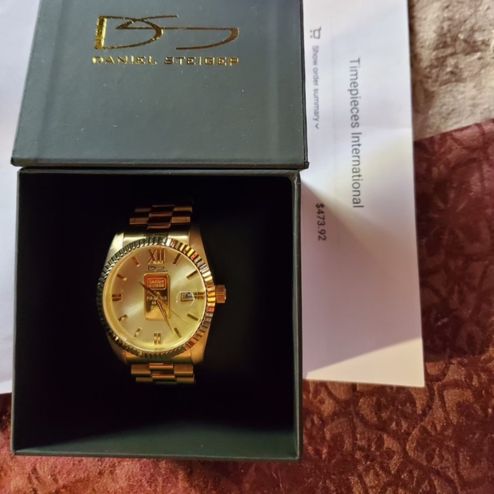 24k gold ( limited edition ) Daniel Steiger men’s watch
